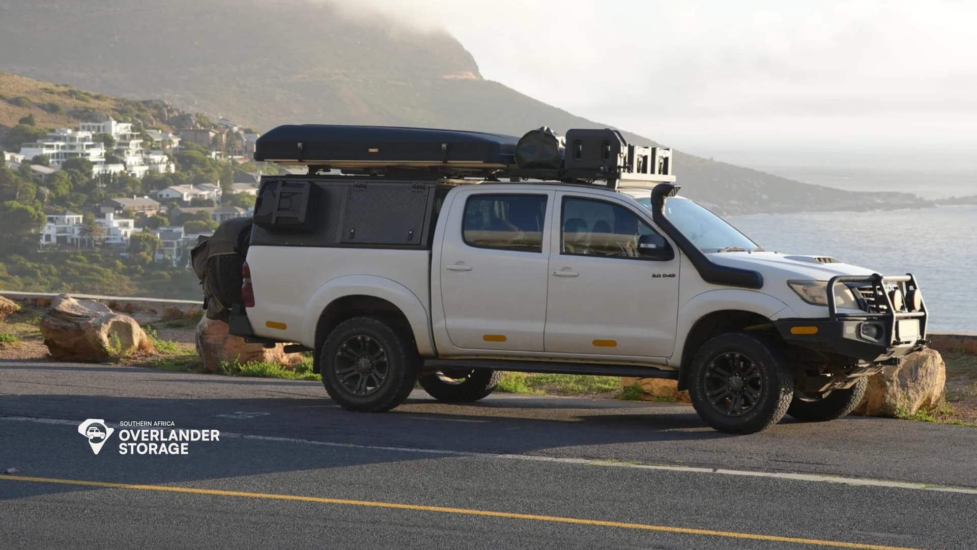 Overlanding Toyota Hilux on African coastal road